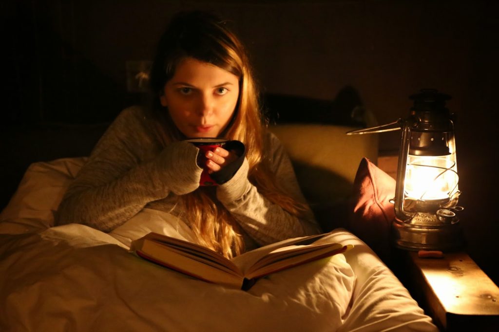 A night time cup of tea and reading, by paraffin lamp, Feather Down Farms,  pic: Kerstin Rodgers/msmarmitelover