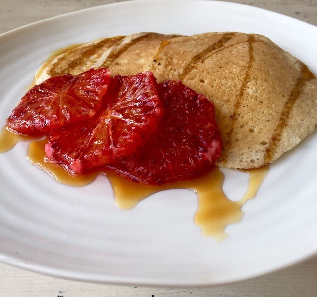 vegan aquafaba pancake with blood orange and maple syrup