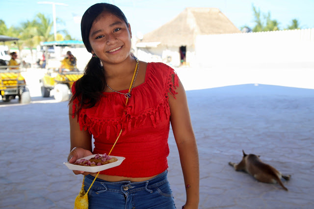 School girl selling street food, holbox mexico