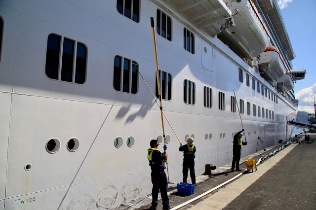 Painting the ship when it's docked.  Britannia, P and O cruise ship. pic: Kerstin Rodgers/msmarmitelover